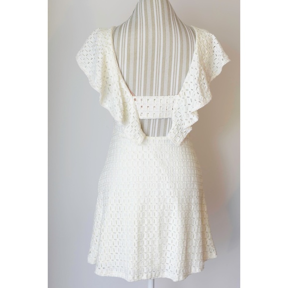 GB Cream Dress with Ruffle Detail and Back Cutout - Picture 1 of 5